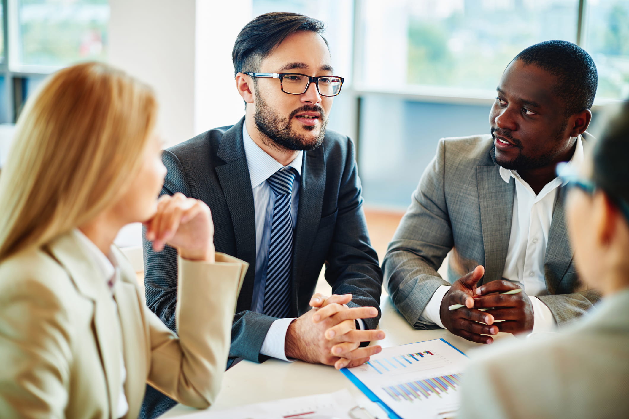 Business meeting with 4 participants.